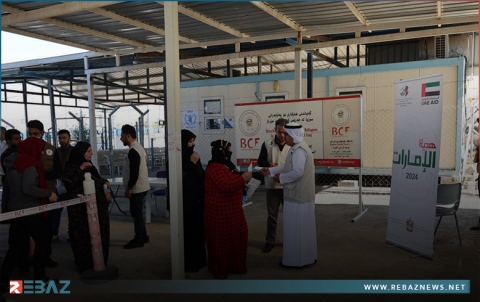 مخيم باسرمة.. بارزاني الخيرية توزع المساعدات النقدية والملابس الشتوية على اللاجئين 