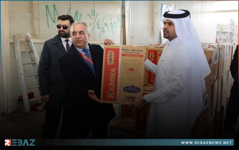 توزيع المدافئ على 417 عائلة في مخيم باسرمة بأربيل