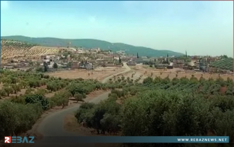 عائلة كوردية نازحة تعود إلى مسقط رأسها في عفرين