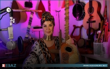 موسيقية كوردية تحيي آلة 